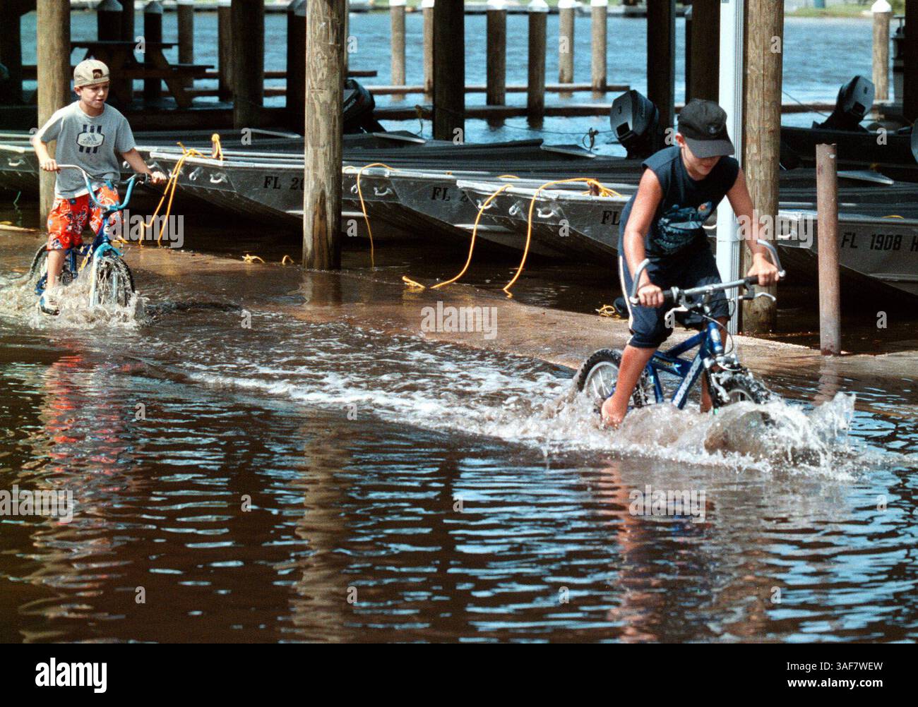 CI.110463.- - DELIVER TO:.Citrus Desk.- -.9/18/2000.- -.Citrus County.- -.CAPTION INFO:.Hurricane Gordon follo photos from Citrus County: #1 - Justin Kelly (cq, right), 8, and friend Clayton Williams (Credit Image: St Petersburg Times/ZUMAPRESS.com) Stock Photo