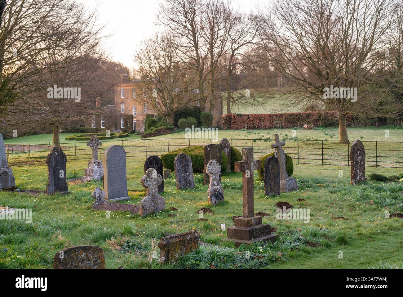 Holy Trinity Churchyard in the spring morning sunlight. Over Worton. Oxfordshire. England. Stock Photo