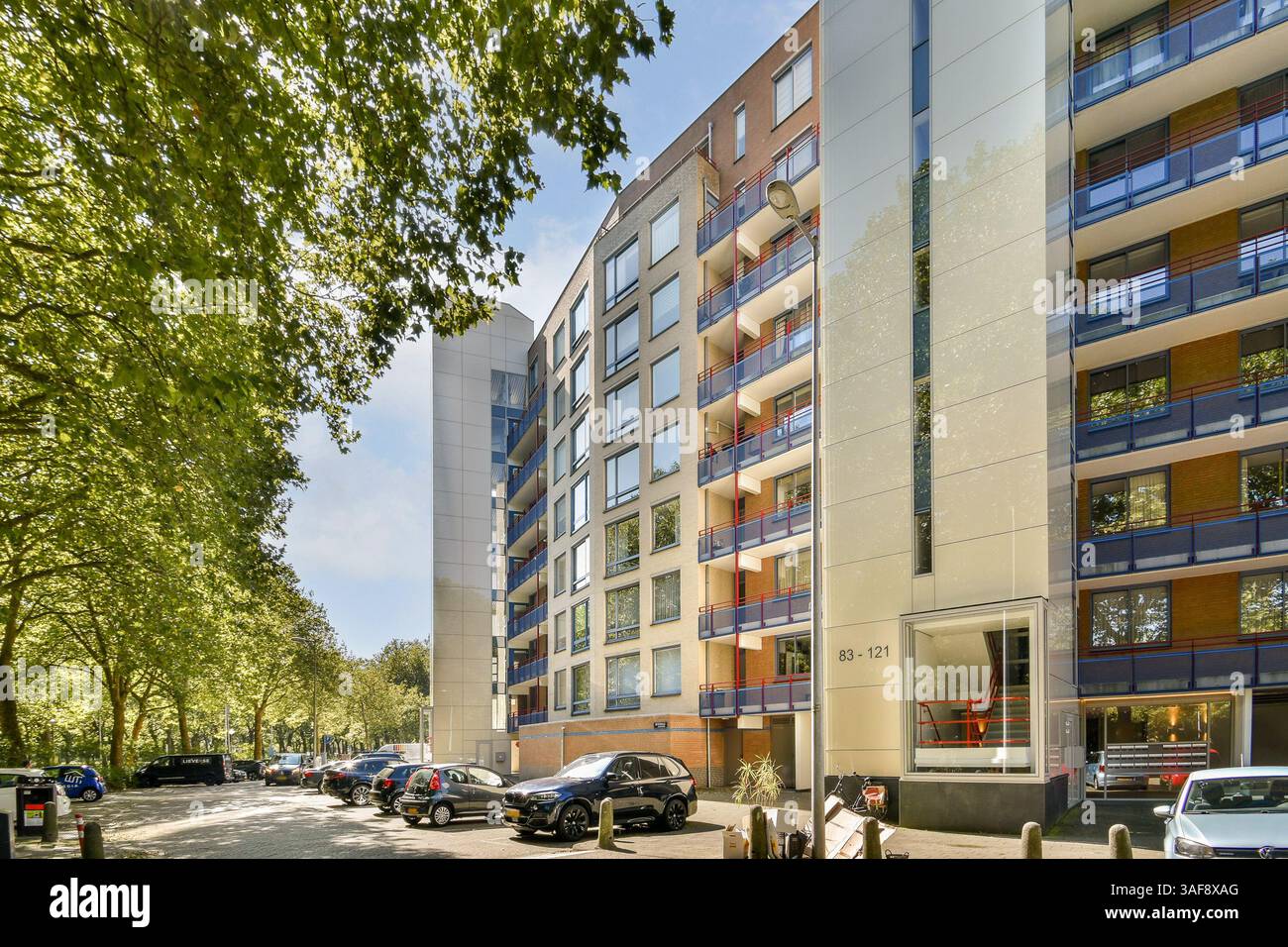 Image showcasing A contemporary apartment complex with a beautiful facade, nestled among ...