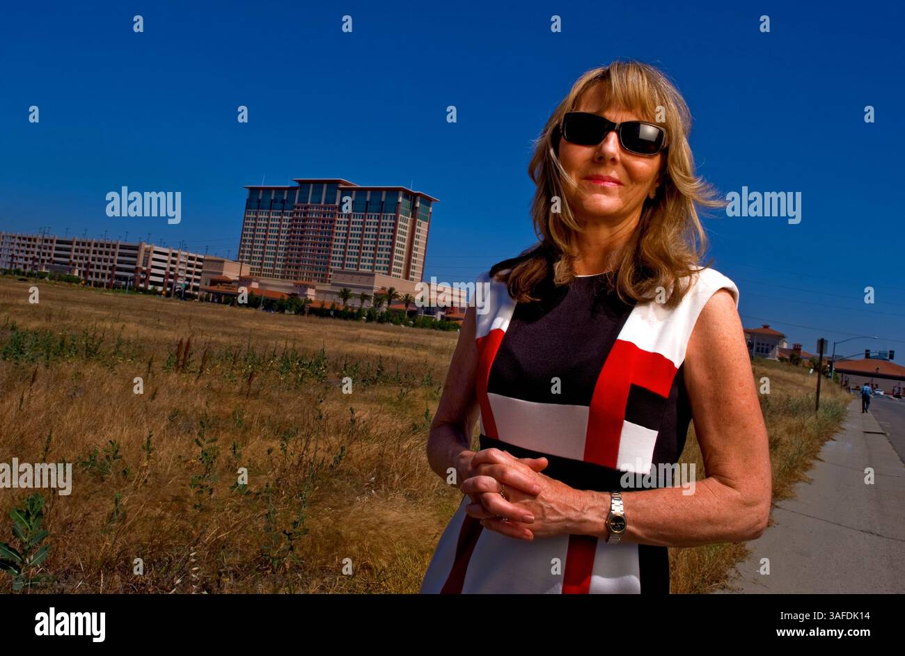 June 14, 2012 - Lincoln, CA, USA - Thunder Valley casino, in Lincoln, California (background) was originally opposed by the surrounding community. When it became evident that the construction and operation of the gaming facility was imminent, citizens in the community working with local government and the tribe helped to develop a mutually beneficial judicially enforceable local agreement. Cheryl Schmit, director of Stand Up For California, seen here outside the casino, June 14, 2012, frequently states the agreement is a model for resolving contentious issues between citizens and tribes throug Stock Photo