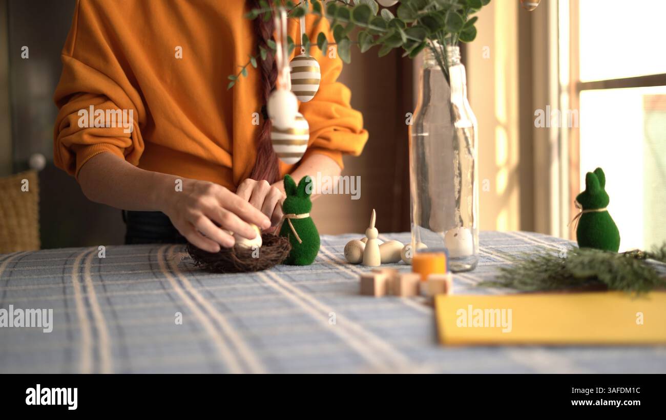 Easter Decorations on a Sunlit Table Stock Photo