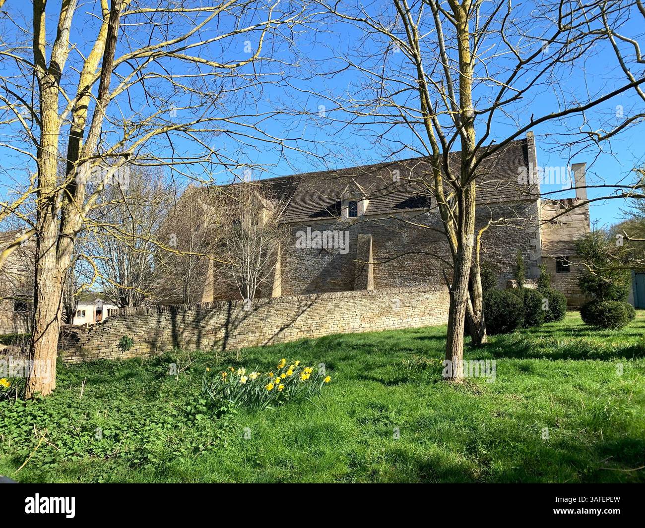 Eastern on the Hill woods farm land pretty walk walking outside tractor wheels wheel sign post signs trees pretty Summer Spring wooded area nice - Smartphone Captured Stock Image