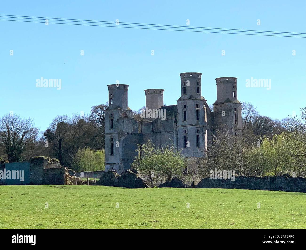 Eastern on the Hill woods farm land pretty walk walking outside tractor wheels wheel sign post signs trees pretty Summer Spring wooded area nice - Smartphone Captured Stock Image