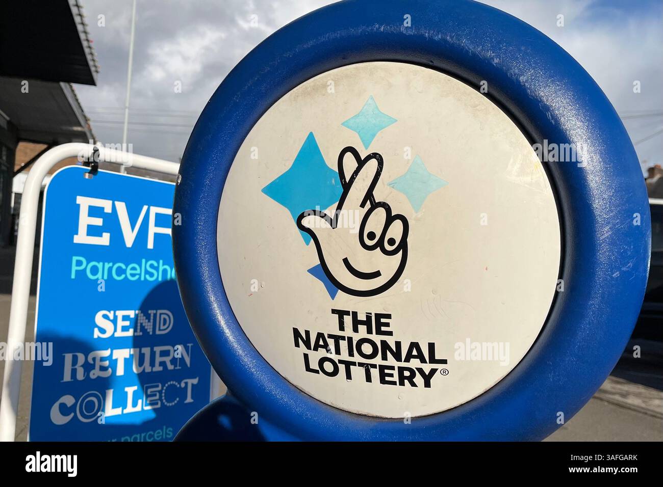 The National Lottery Sign outside a newsagent in Killay. Swansea, Wales, United Kingdom. 28th March 2025. - Smartphone Captured Stock Image