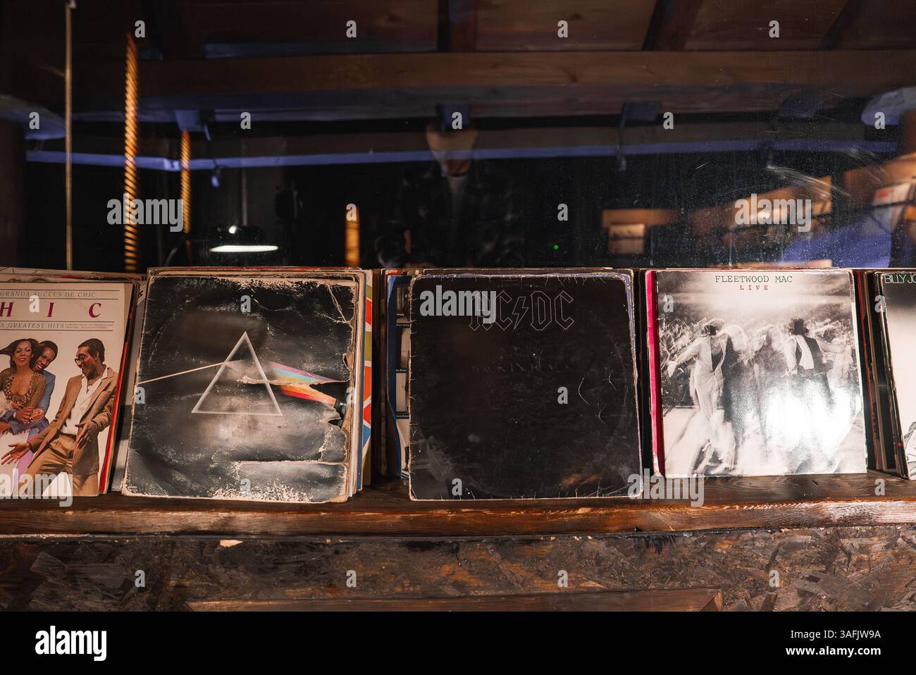 Vintage Vinyl Records Displayed on Wooden Shelf in Rustic Interior ...