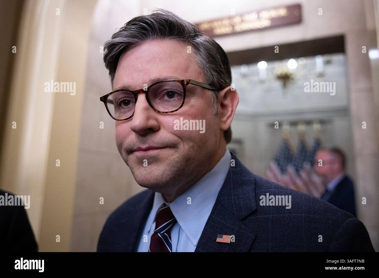 House Speaker Mike Johnson (R-La.) stops to speak to reporters outside ...
