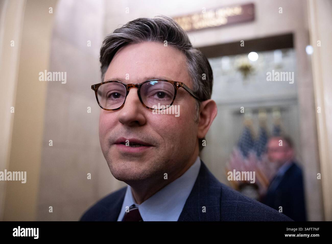 House Speaker Mike Johnson (R-La.) stops to speak to reporters outside ...