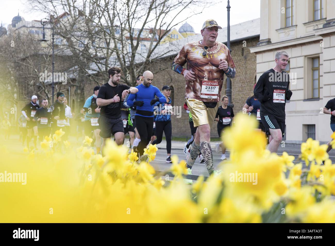 runners-run-along-daffodils-on-spandauer-damm-at-the-44th-generali
