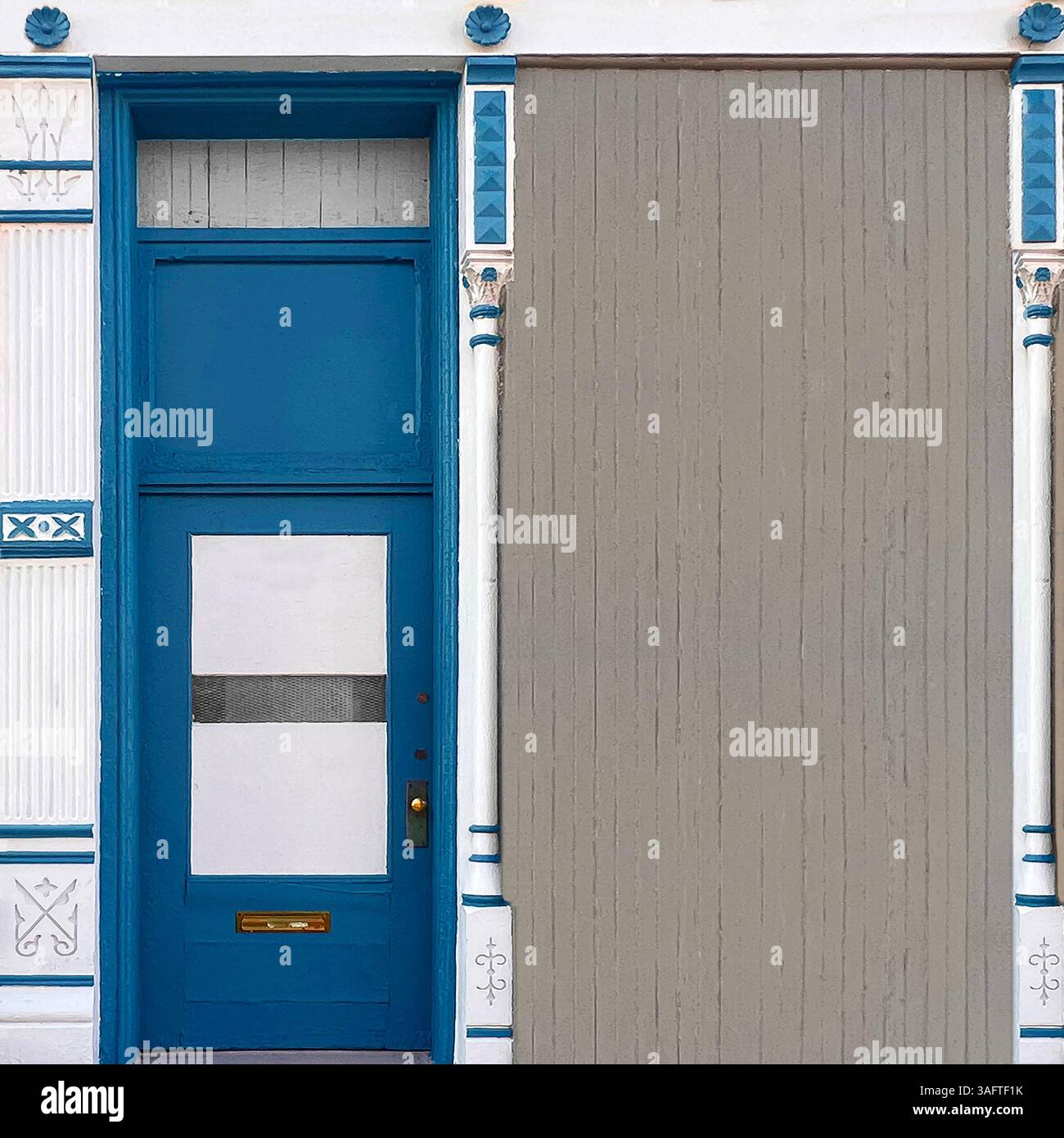 Ornate blue doorway with white paneling and decorative columns on a historic Chicago building - Smartphone Captured Stock Image