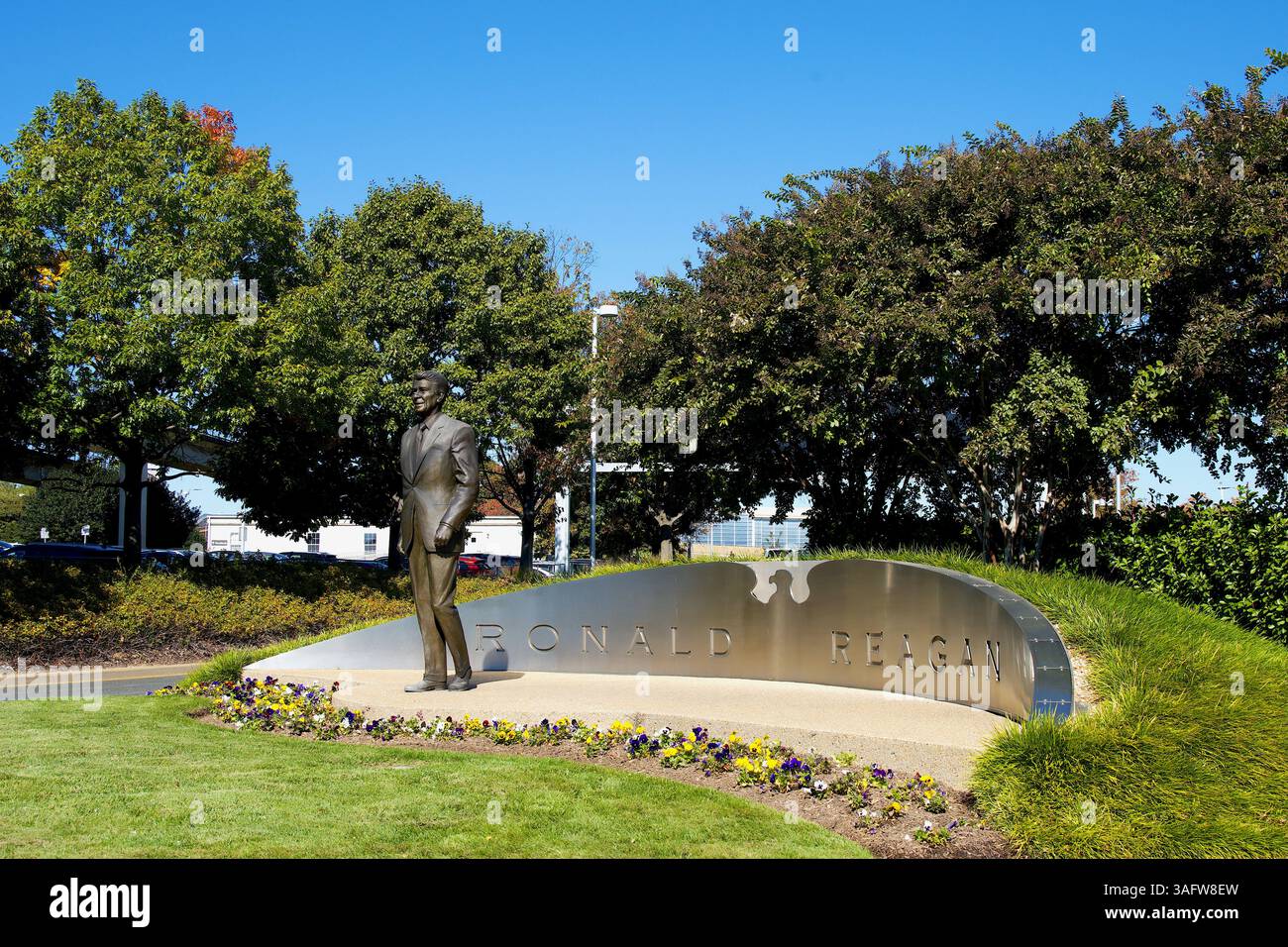 Arlington, Virginia, USA - October 21, 2024: A memorial honors President Ronald Reagan at the entrance to Ronald Reagan Washington National Airport. Stock Photo