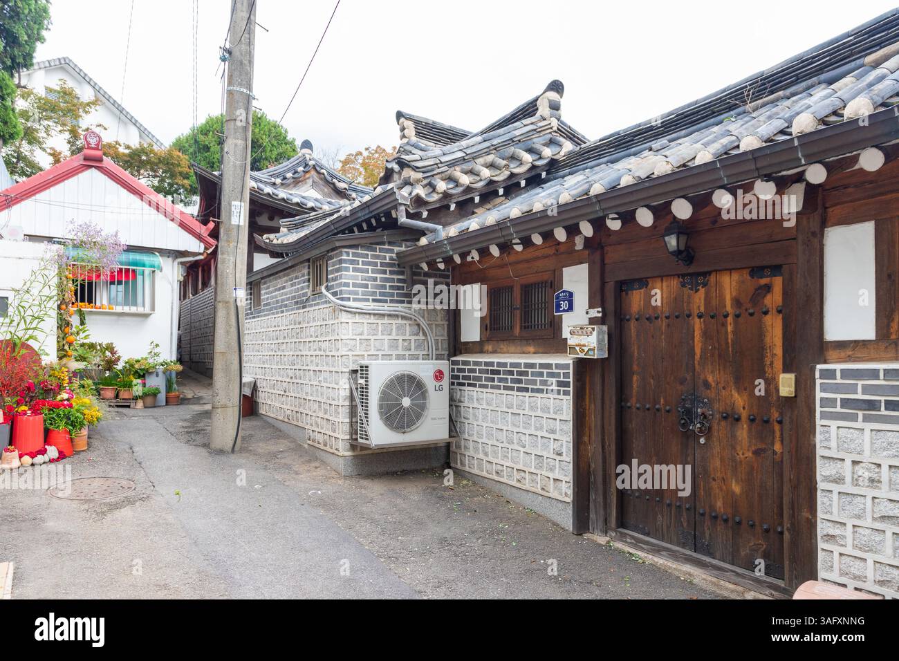 Bukchon Hanok Village is a residential neighborhood in Jongno District ...