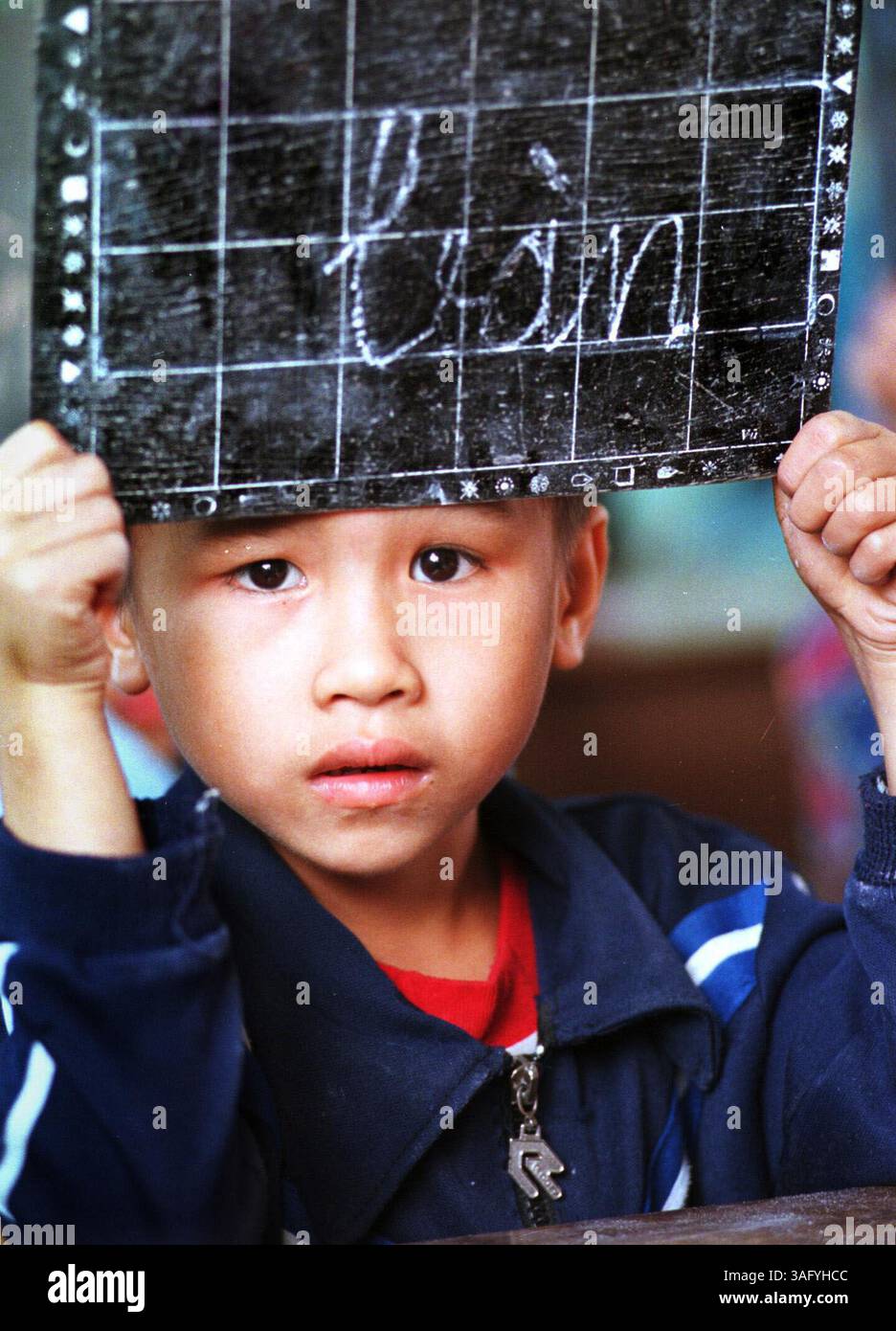 A Student At The Trieu Le Primary School Sponsored By Louis Puller An a-student-at-the-trieu-le-primary-school-sponsored-by-louis-puller-an