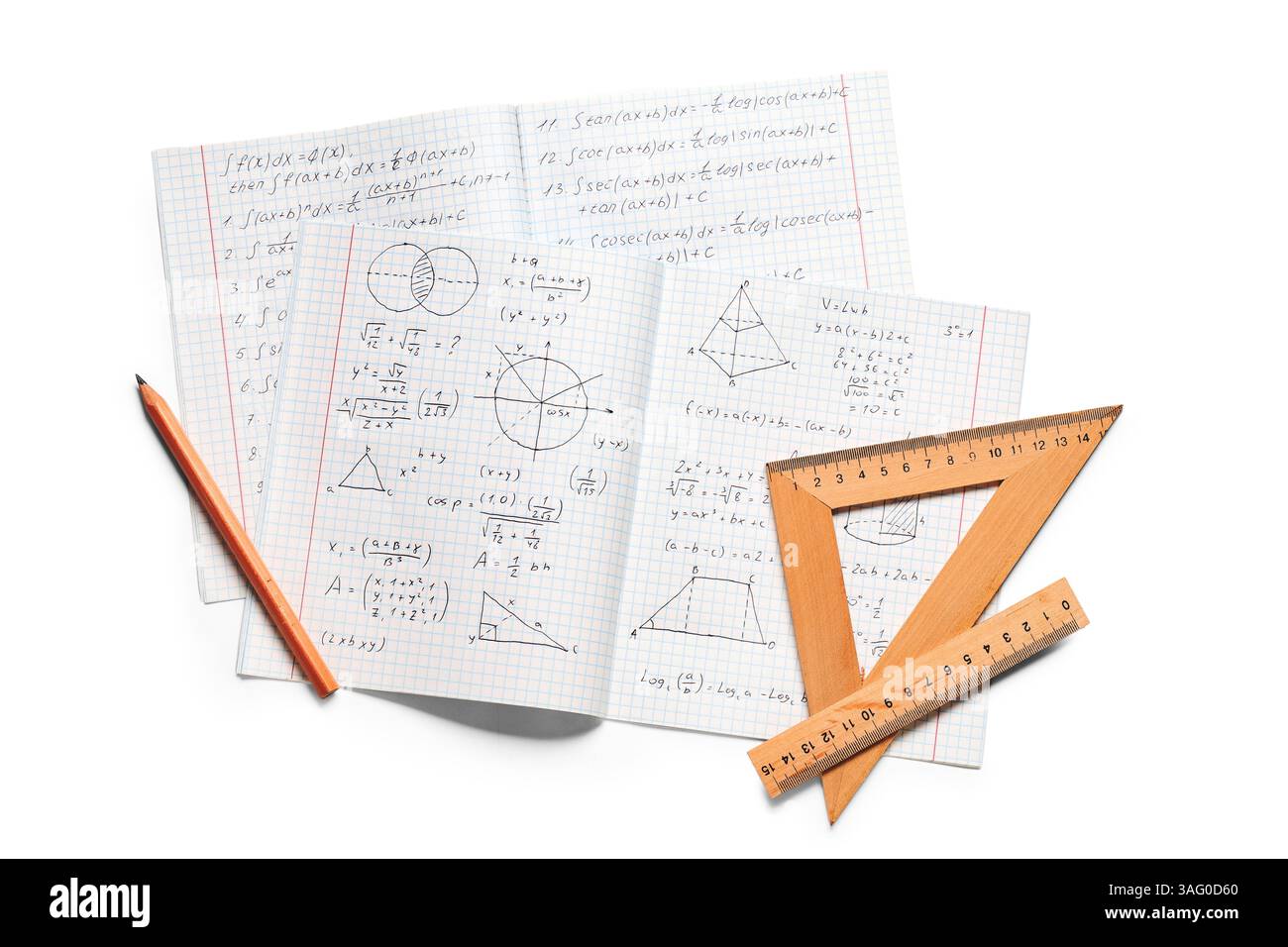 Copybook with handwritten maths formulas, pencil and rulers isolated on ...