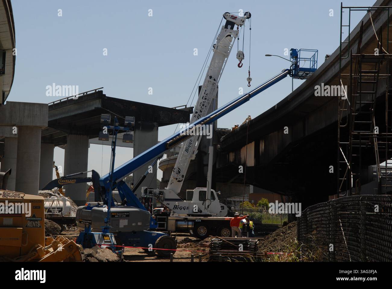 CalTrans work on the destroyed a ramp, caused by a gasoline tanker ...