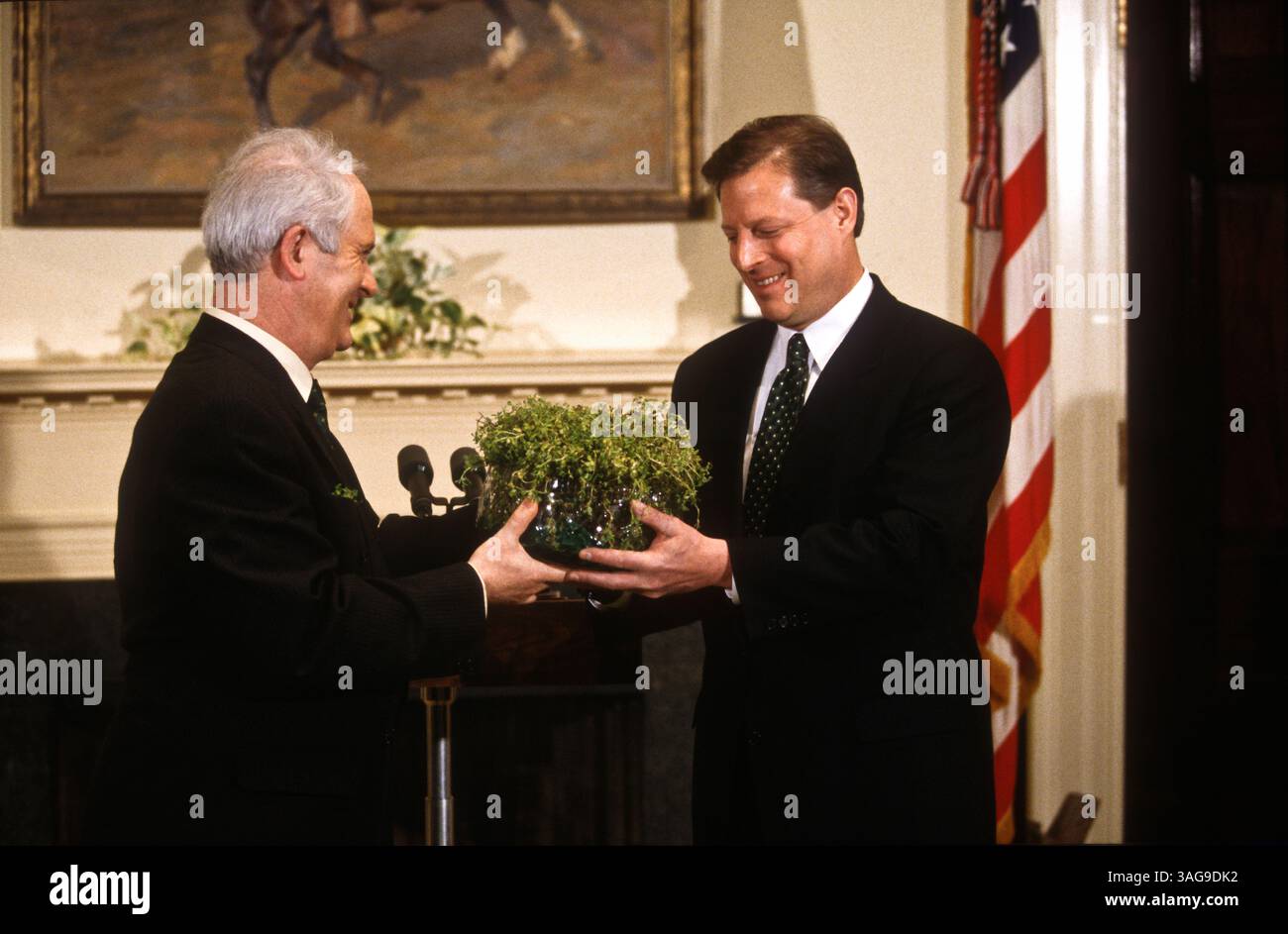March 17, 1997 - Washington, DC, USA - Irish Prime Minister John Bruton presents Vice President Al Gore the traditional St. Patrick's Day bowl of shamrocks at the White House March 17, 1997 in Washington, DC. (Credit Image: © Richard Ellis/ZUMAPRESS.com) Stock Photo