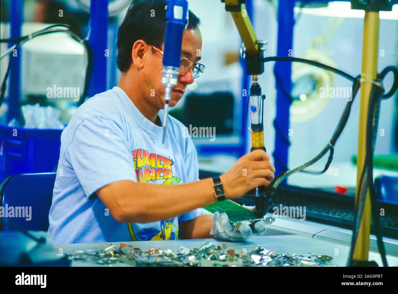 Santa Clara, California, USA, 3-Com Corporation, Asian Man Working ...