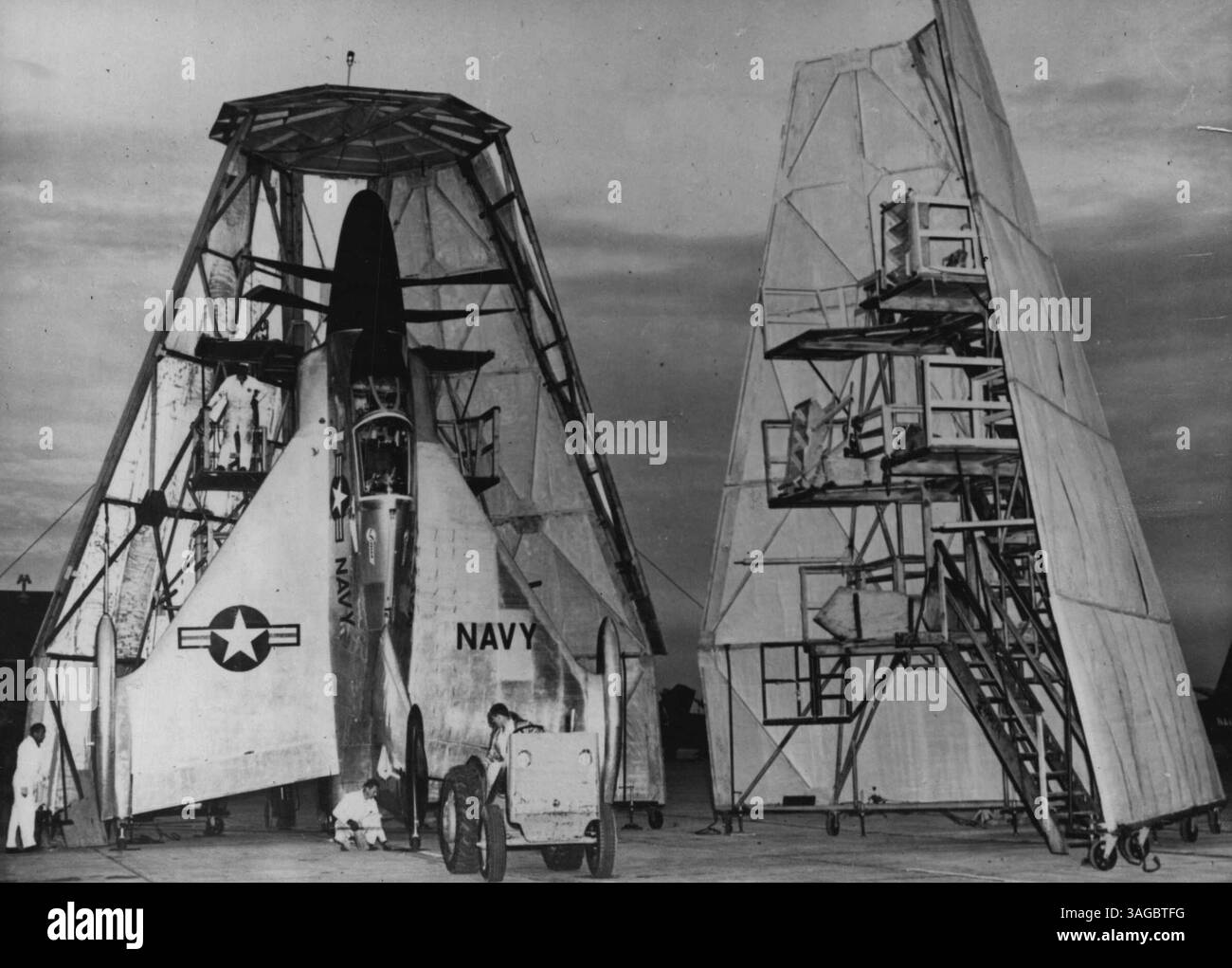 Vertical hangar a tractor pushed the convair into position in its