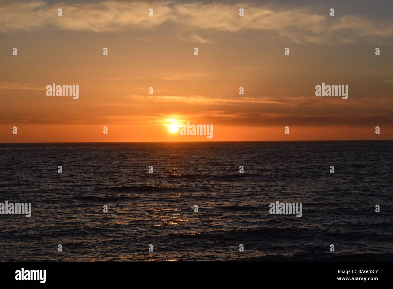 Golden Hour Over the Pacific: A Serene Sunset at Moonstone Beach, Cambria - Stock Image