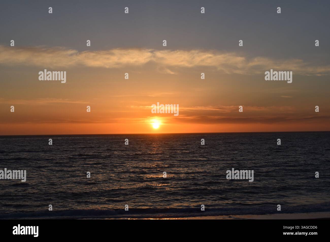 Golden Hour Over the Pacific: A Serene Sunset at Moonstone Beach, Cambria - Stock Image