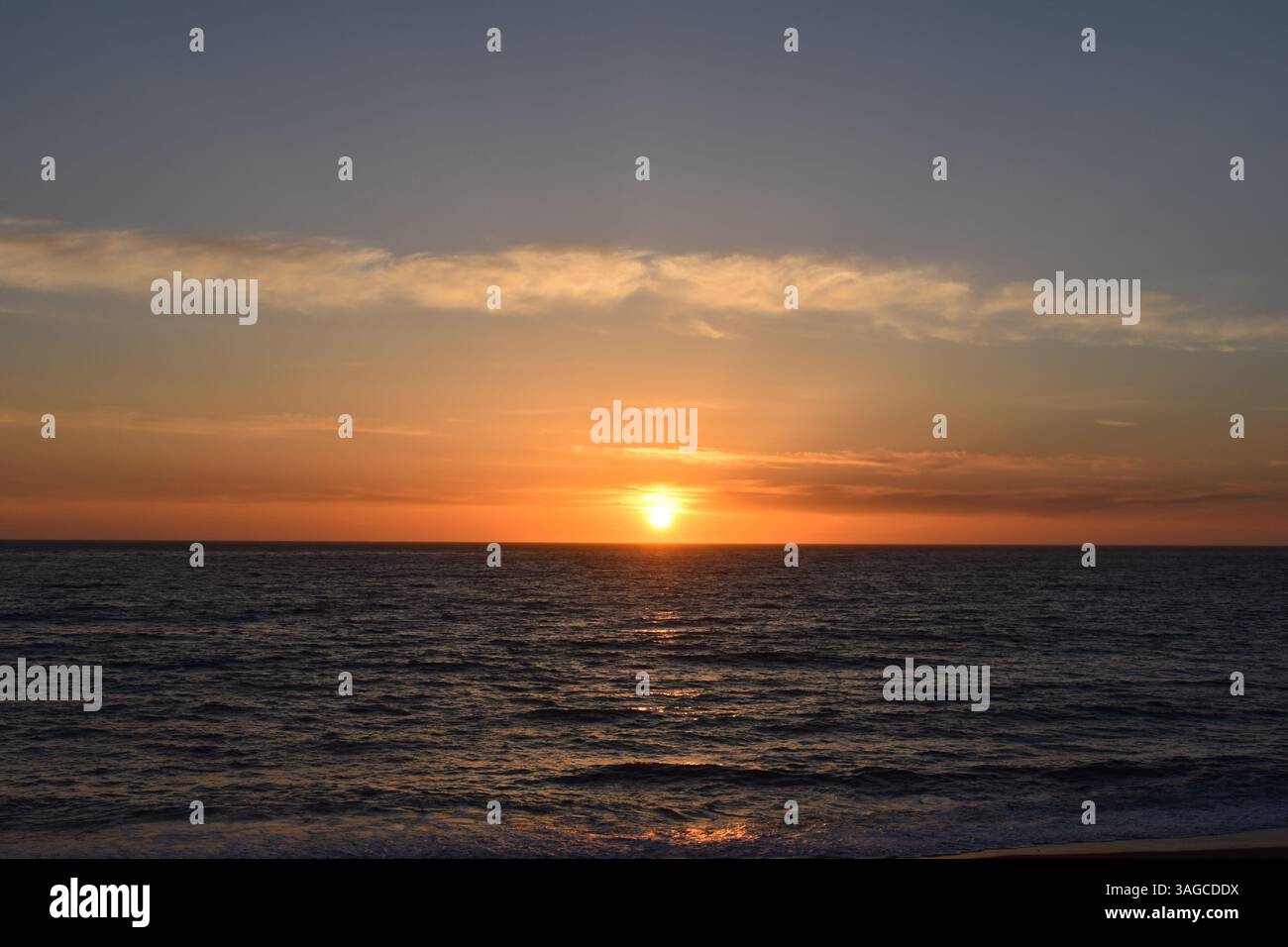 Golden Hour Over the Pacific: A Serene Sunset at Moonstone Beach, Cambria - Stock Image