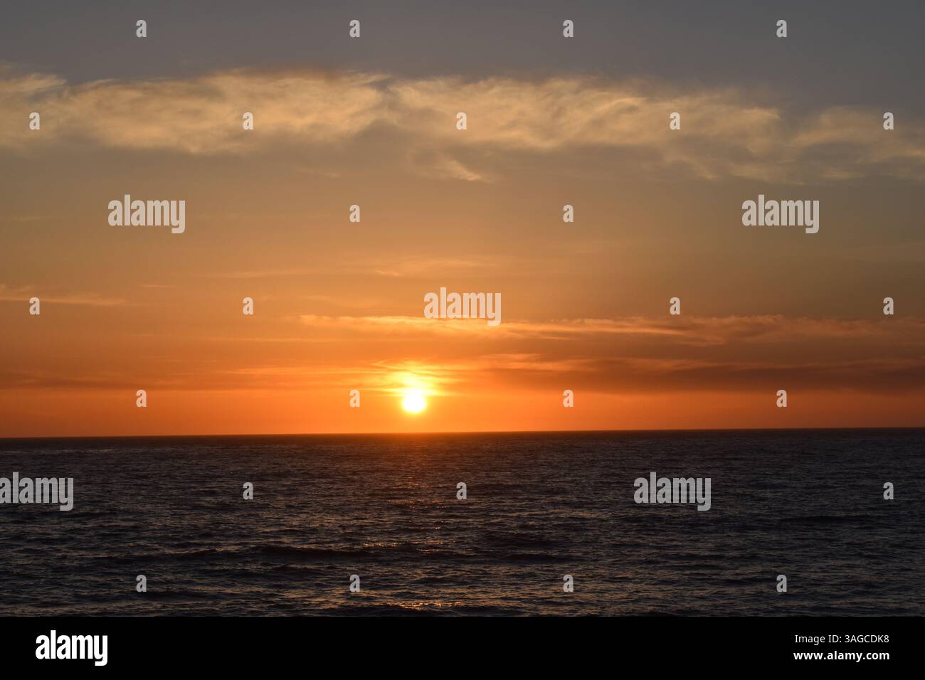 Golden Hour Over the Pacific: A Serene Sunset at Moonstone Beach, Cambria - Stock Image