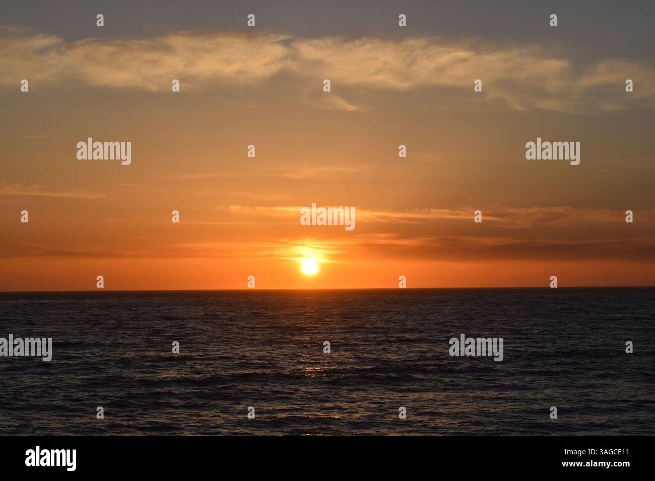 Golden Hour Over the Pacific: A Serene Sunset at Moonstone Beach, Cambria - Stock Image