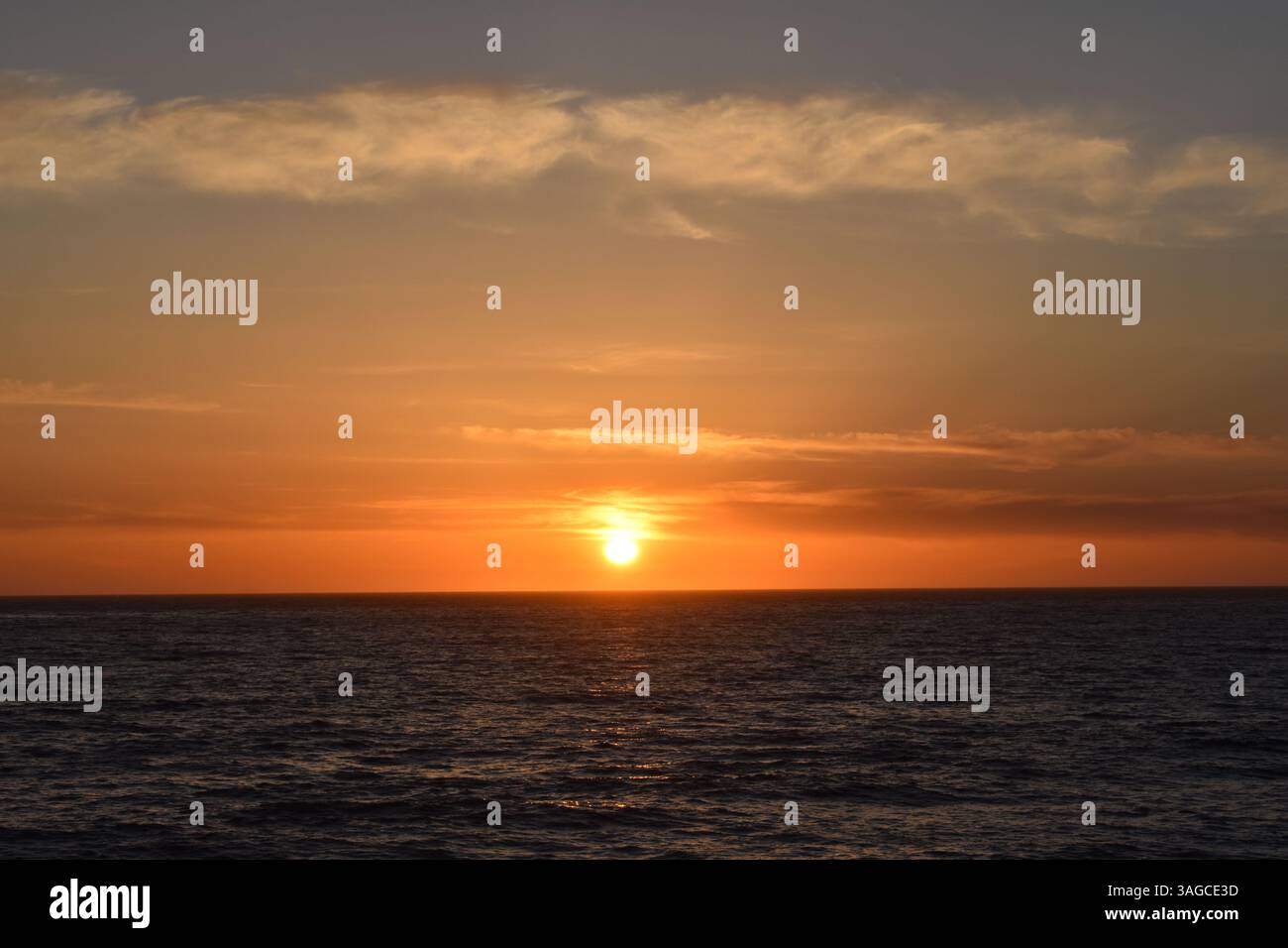 Golden Hour Over the Pacific: A Serene Sunset at Moonstone Beach, Cambria - Stock Image