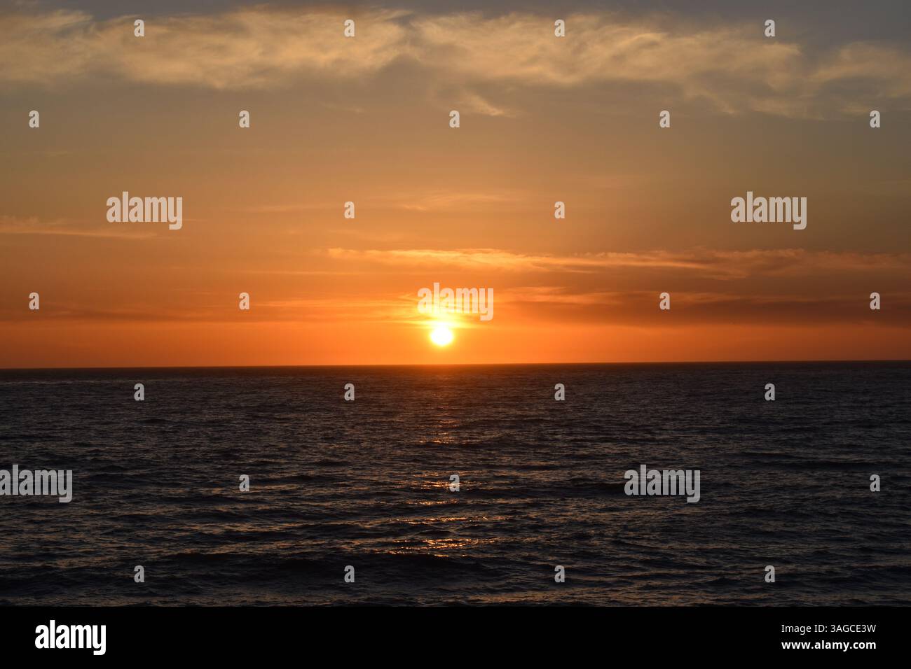 Golden Hour Over the Pacific: A Serene Sunset at Moonstone Beach, Cambria - Stock Image