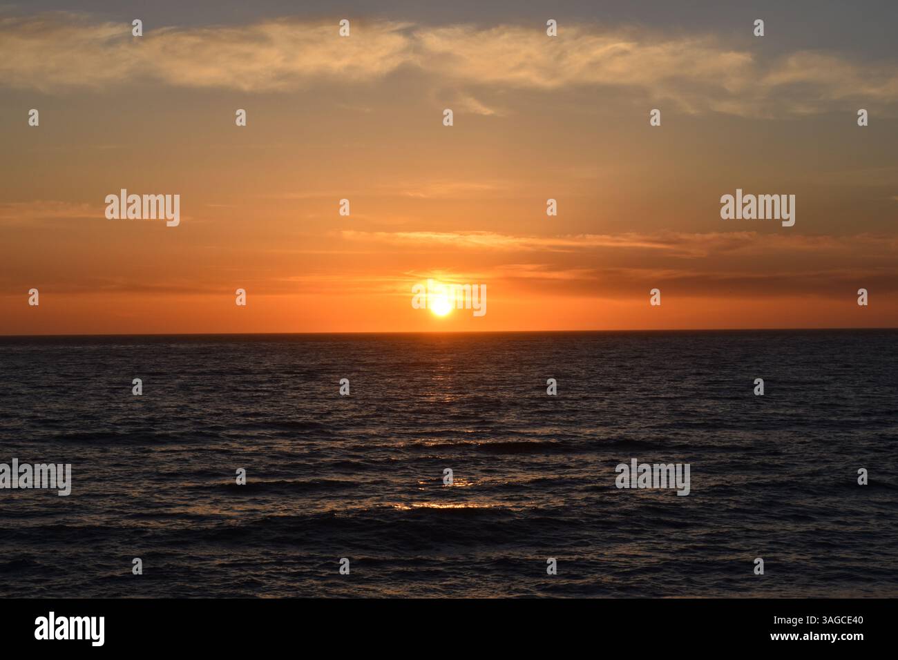Golden Hour Over the Pacific: A Serene Sunset at Moonstone Beach, Cambria - Stock Image