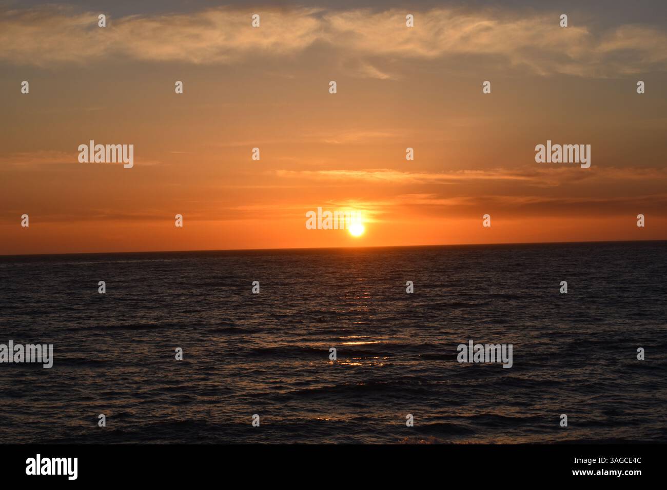 Golden Hour Over the Pacific: A Serene Sunset at Moonstone Beach, Cambria - Stock Image