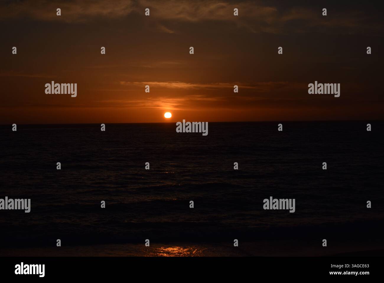 Golden Hour Over the Pacific: A Serene Sunset at Moonstone Beach, Cambria - Stock Image