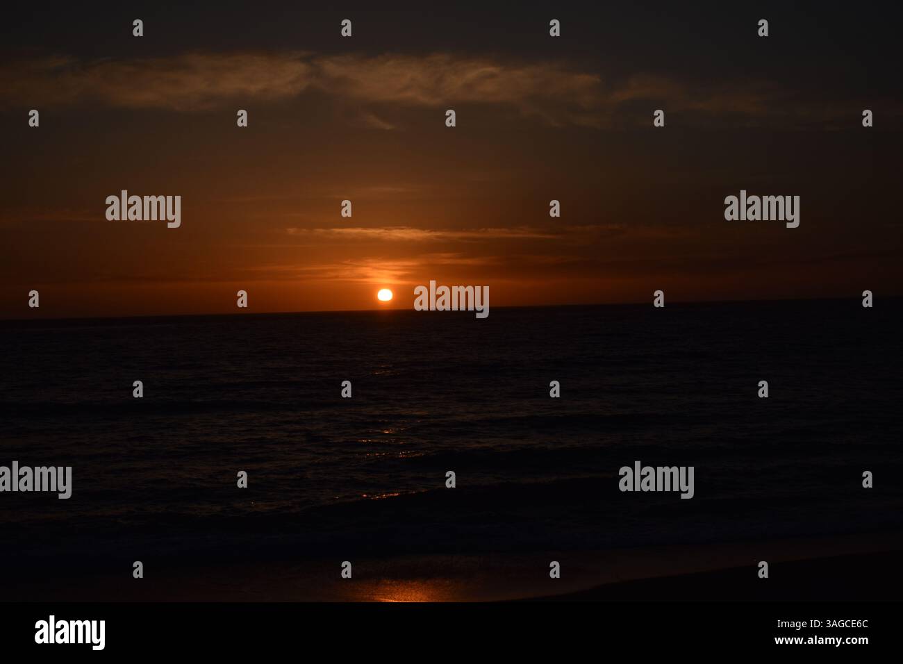 Golden Hour Over the Pacific: A Serene Sunset at Moonstone Beach, Cambria - Stock Image