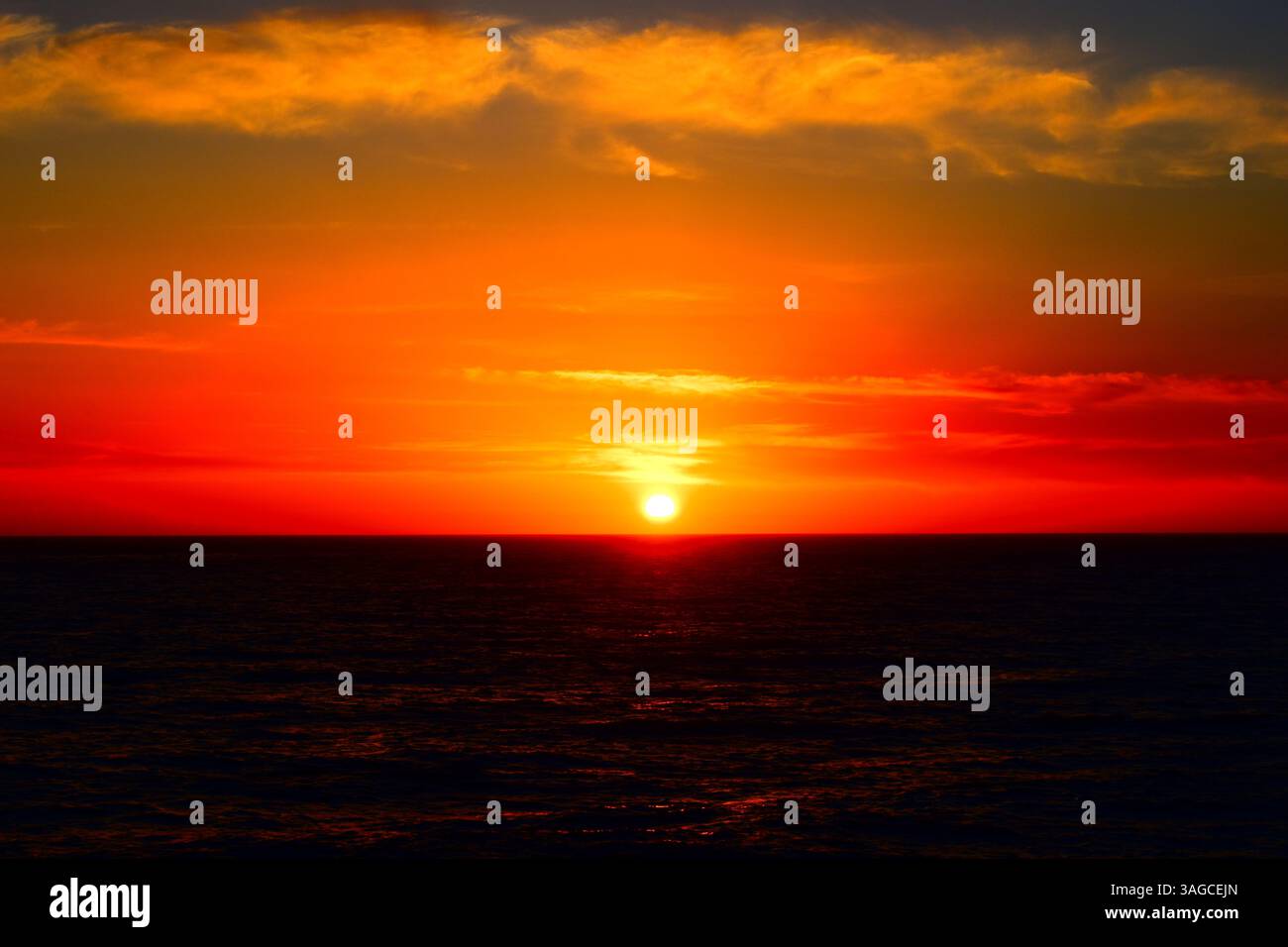Golden Hour Over the Pacific: A Serene Sunset at Moonstone Beach, Cambria - Stock Image