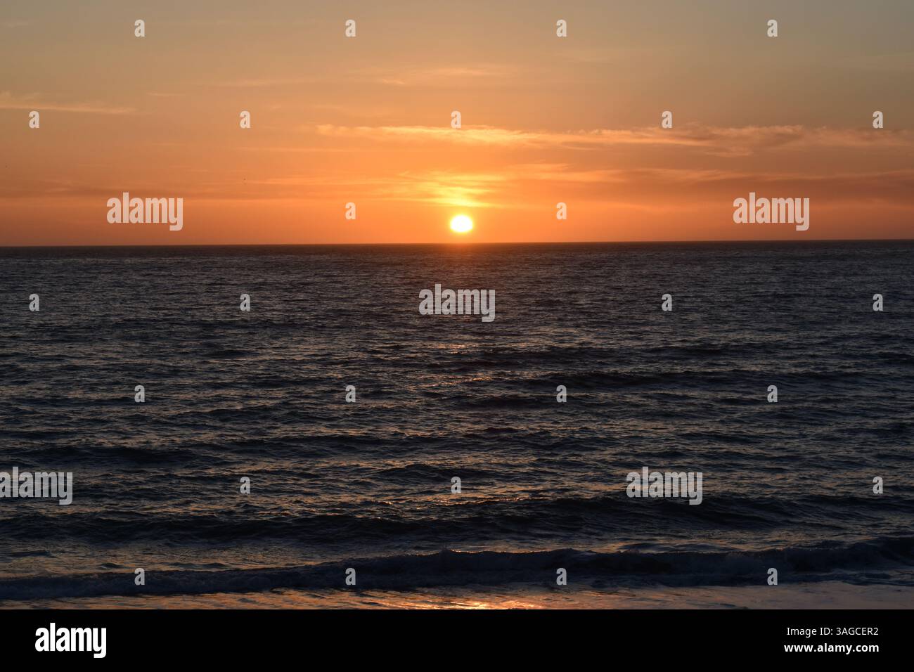 Golden Hour Over the Pacific: A Serene Sunset at Moonstone Beach, Cambria - Stock Image