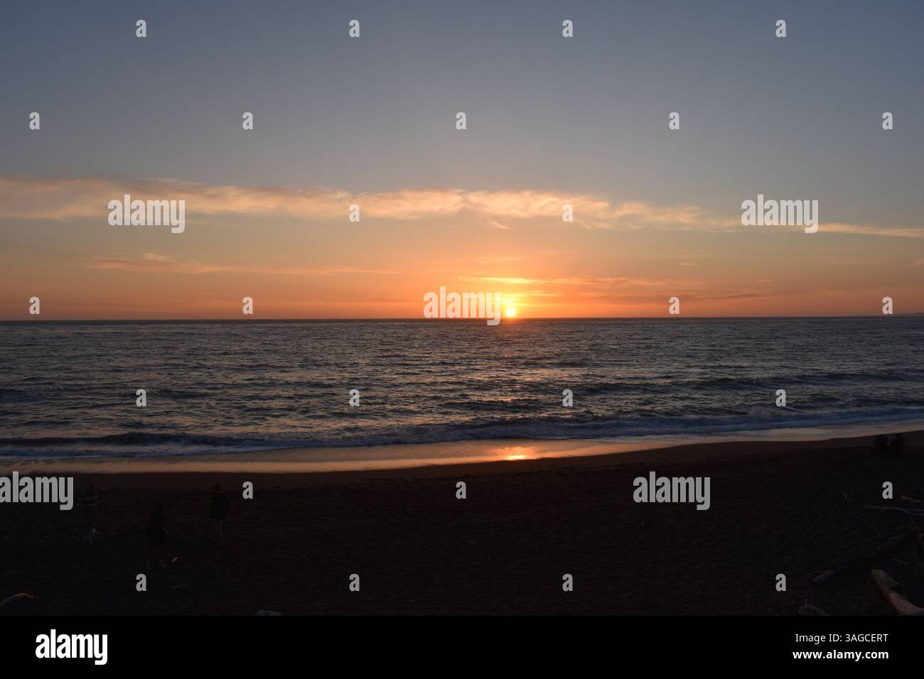 Golden Hour Over the Pacific: A Serene Sunset at Moonstone Beach, Cambria - Stock Image