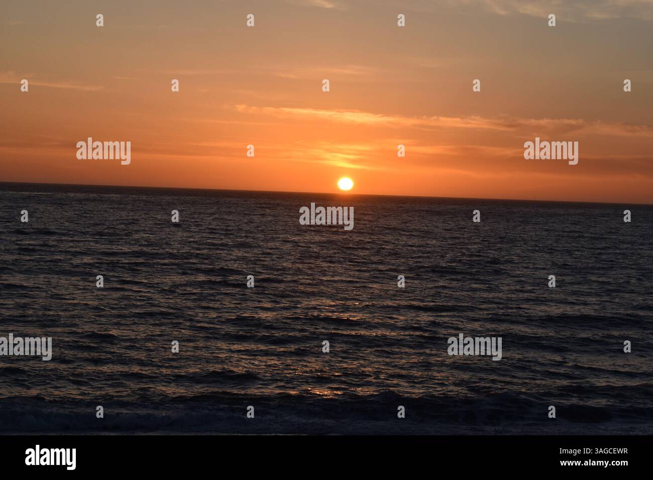 Golden Hour Over the Pacific: A Serene Sunset at Moonstone Beach, Cambria - Stock Image