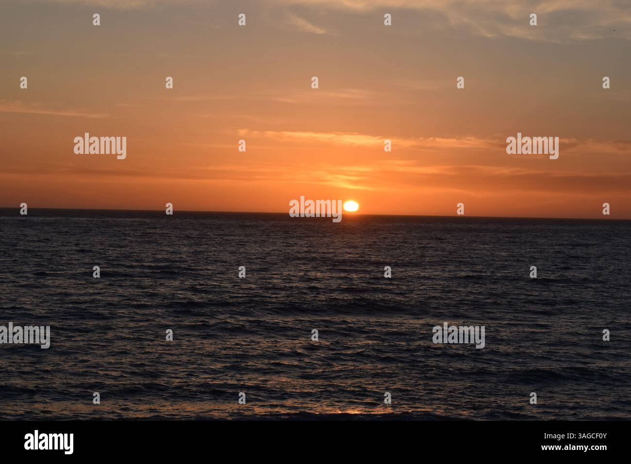 Golden Hour Over the Pacific: A Serene Sunset at Moonstone Beach, Cambria - Stock Image