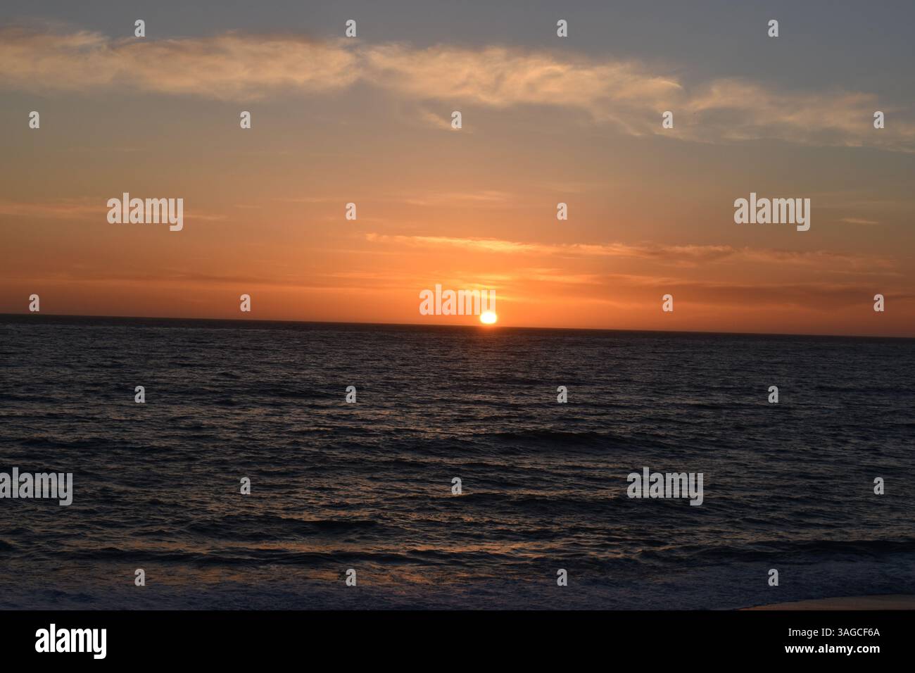 Golden Hour Over the Pacific: A Serene Sunset at Moonstone Beach, Cambria - Stock Image