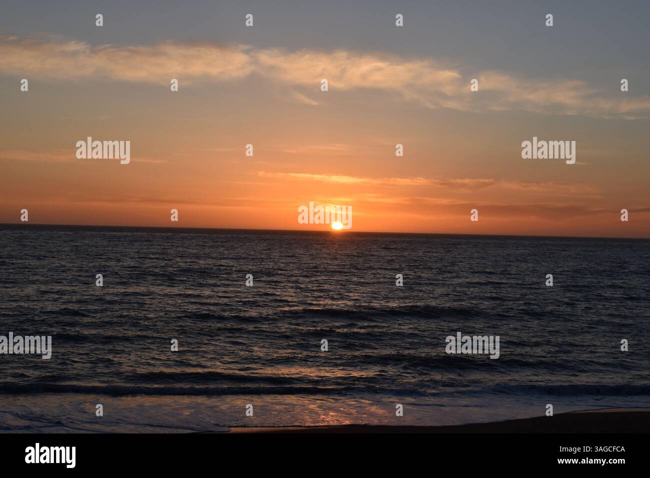 Golden Hour Over the Pacific: A Serene Sunset at Moonstone Beach, Cambria - Stock Image