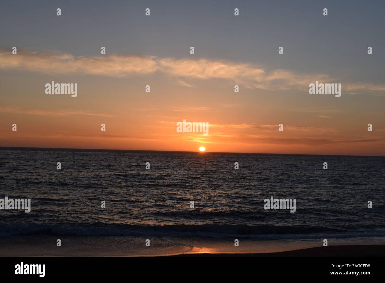 Golden Hour Over the Pacific: A Serene Sunset at Moonstone Beach, Cambria - Stock Image