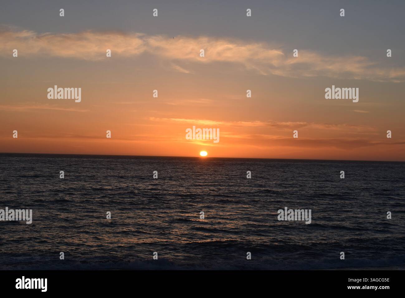 Golden Hour Over the Pacific: A Serene Sunset at Moonstone Beach, Cambria - Stock Image