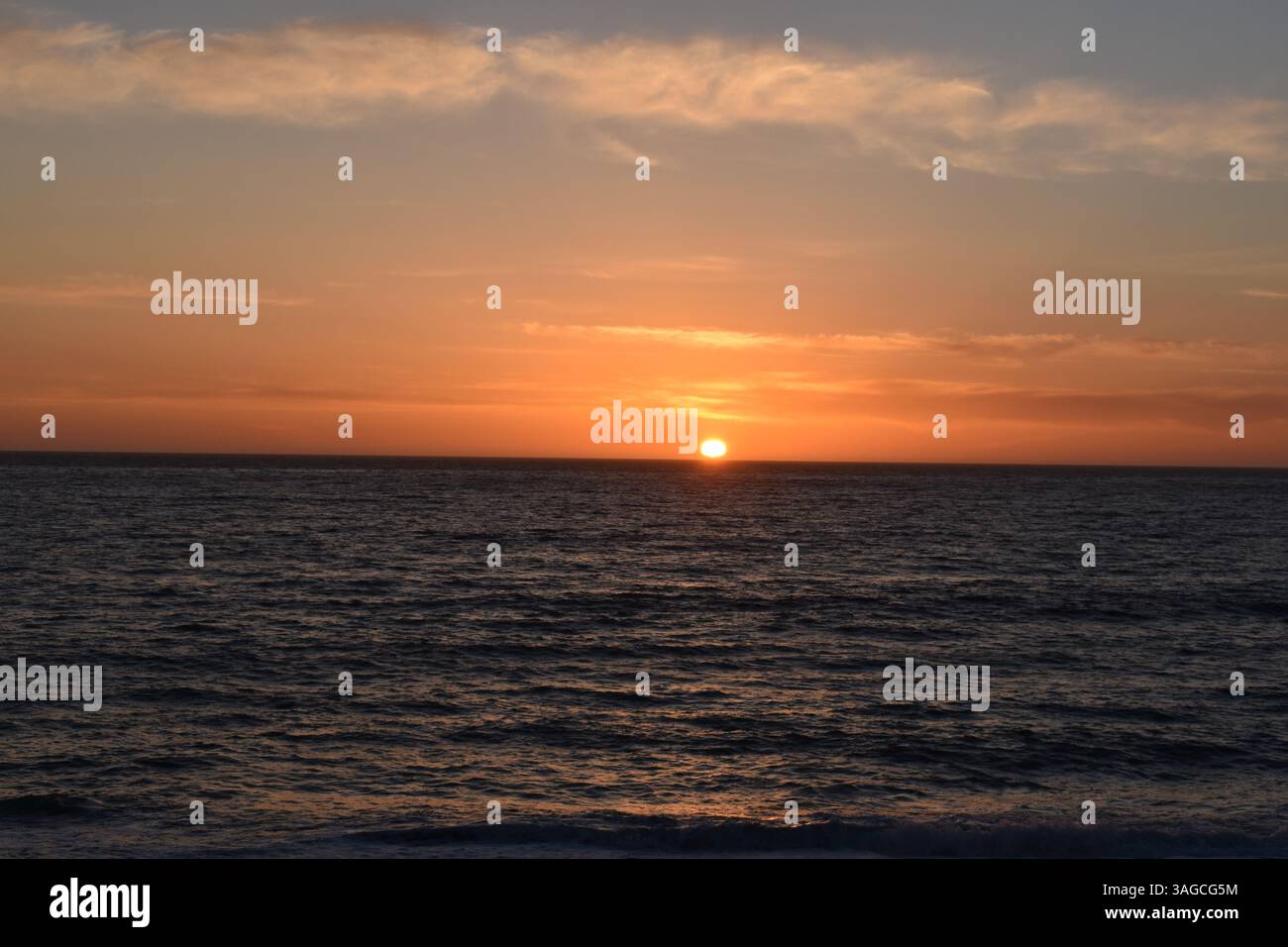 Golden Hour Over the Pacific: A Serene Sunset at Moonstone Beach, Cambria - Stock Image