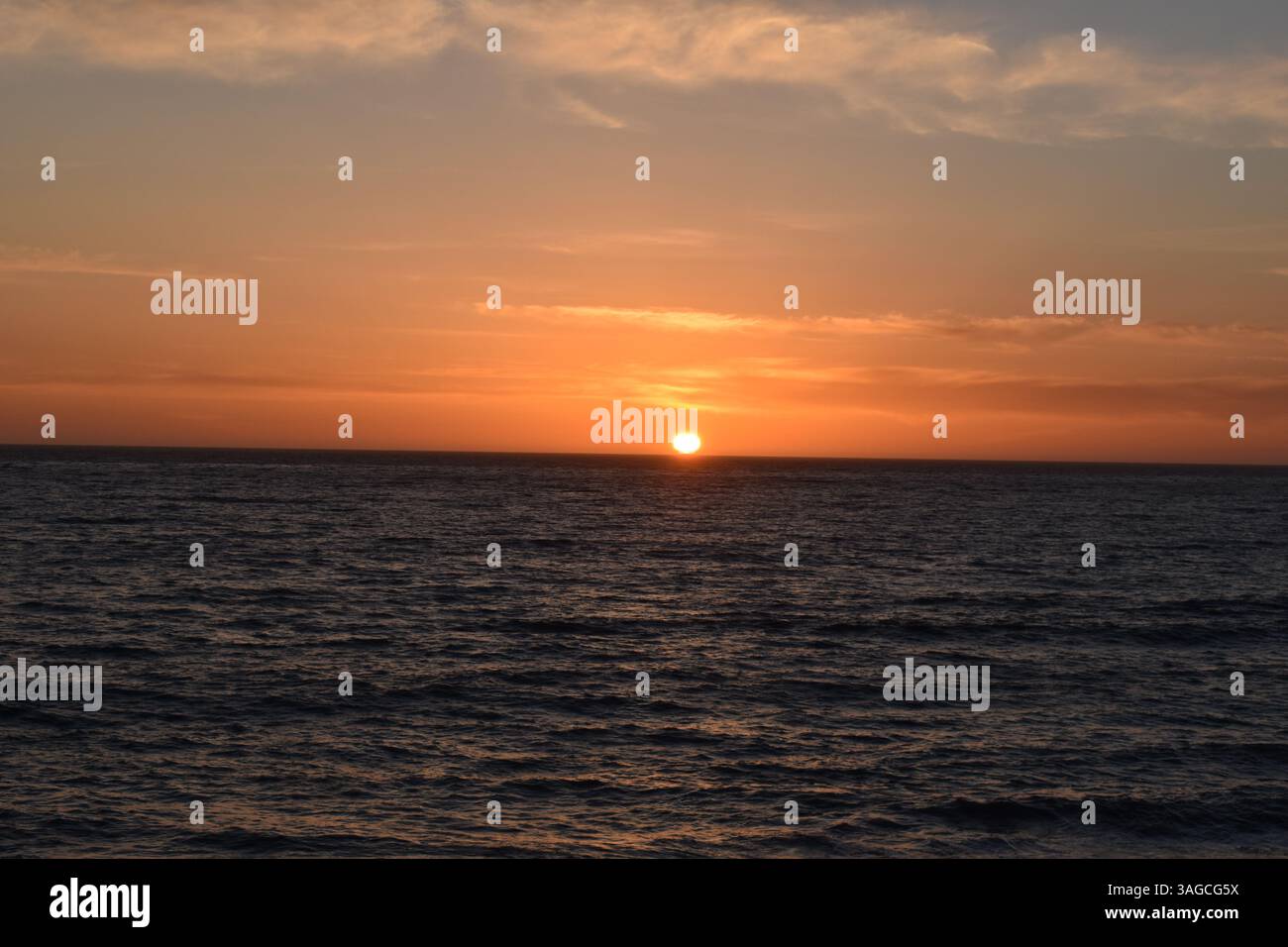 Golden Hour Over the Pacific: A Serene Sunset at Moonstone Beach, Cambria - Stock Image