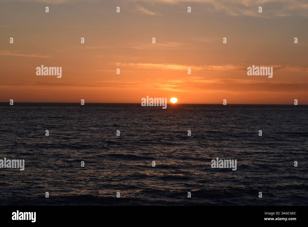 Golden Hour Over the Pacific: A Serene Sunset at Moonstone Beach, Cambria - Stock Image
