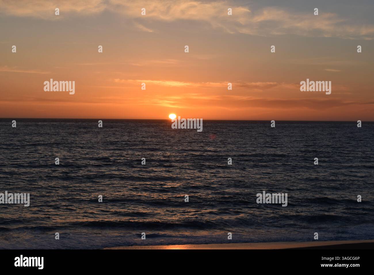 Golden Hour Over the Pacific: A Serene Sunset at Moonstone Beach, Cambria - Stock Image
