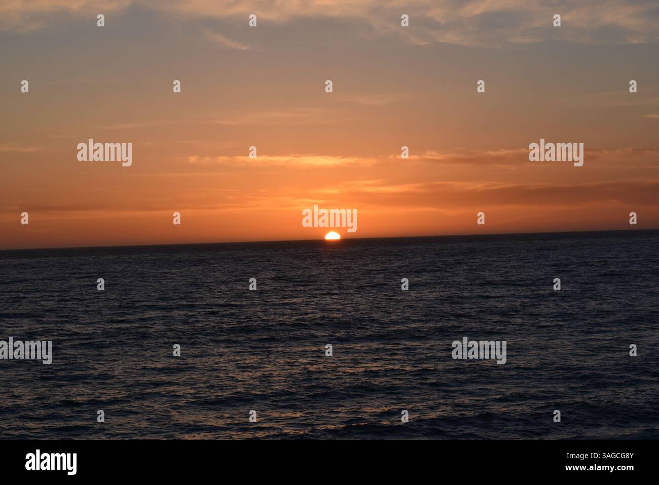 Golden Hour Over the Pacific: A Serene Sunset at Moonstone Beach, Cambria - Stock Image