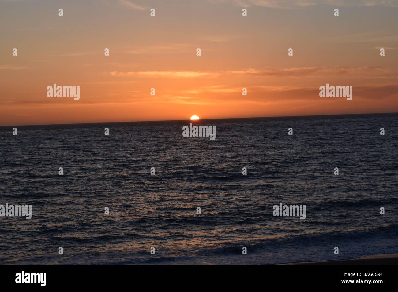 Golden Hour Over the Pacific: A Serene Sunset at Moonstone Beach, Cambria - Stock Image