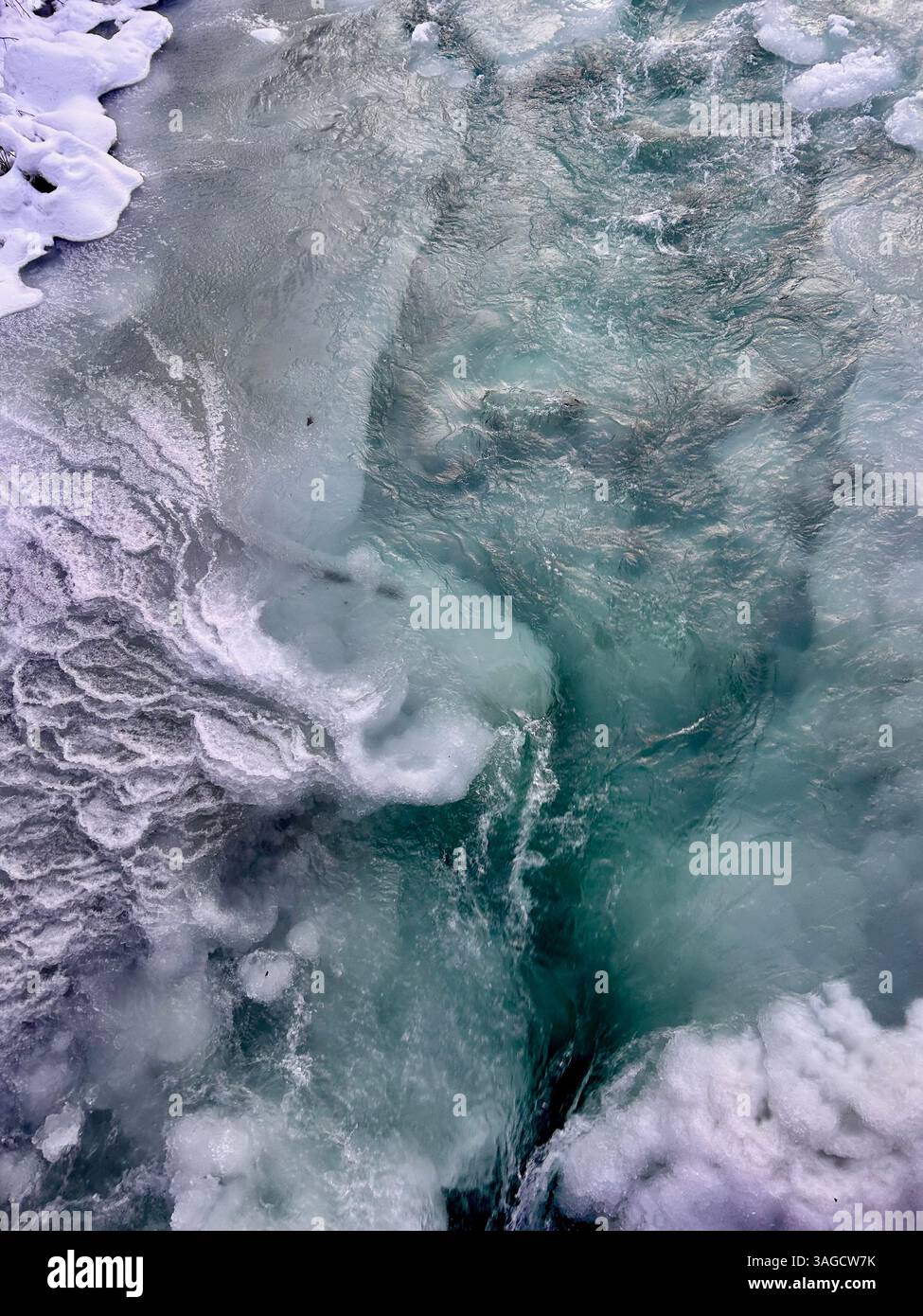 Frozen River with Turquoise Ice Formations - Smartphone Captured Stock Image