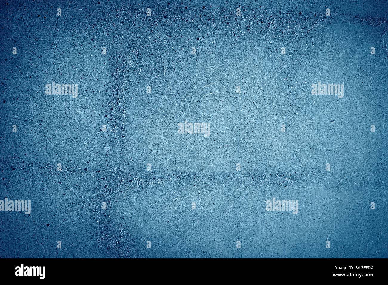 surface with a dark blue color featuring a rough, uneven texture Stock Photo