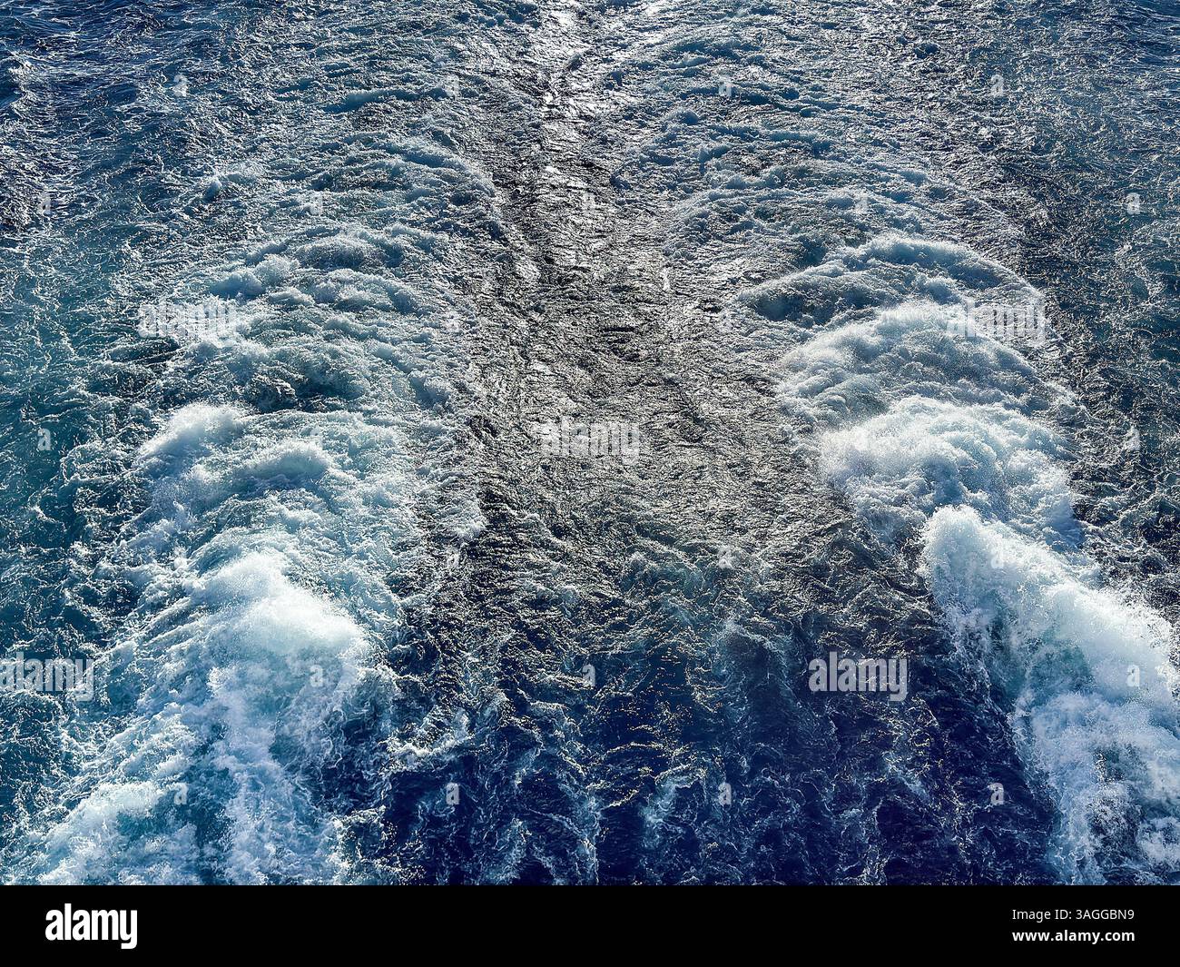 Pattern formed by the wake of the powerful engines of a cruise ship at sea. Backgrounds. Cruise vacation concept. No people. - Smartphone Captured Stock Image